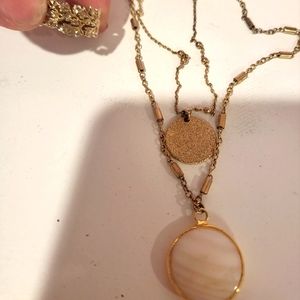 Necklace and ring set the necklace is a double necklace made in two.